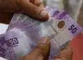 Peso pierde terreno ante el dólar